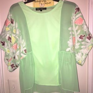 Green sheer top with floral detail